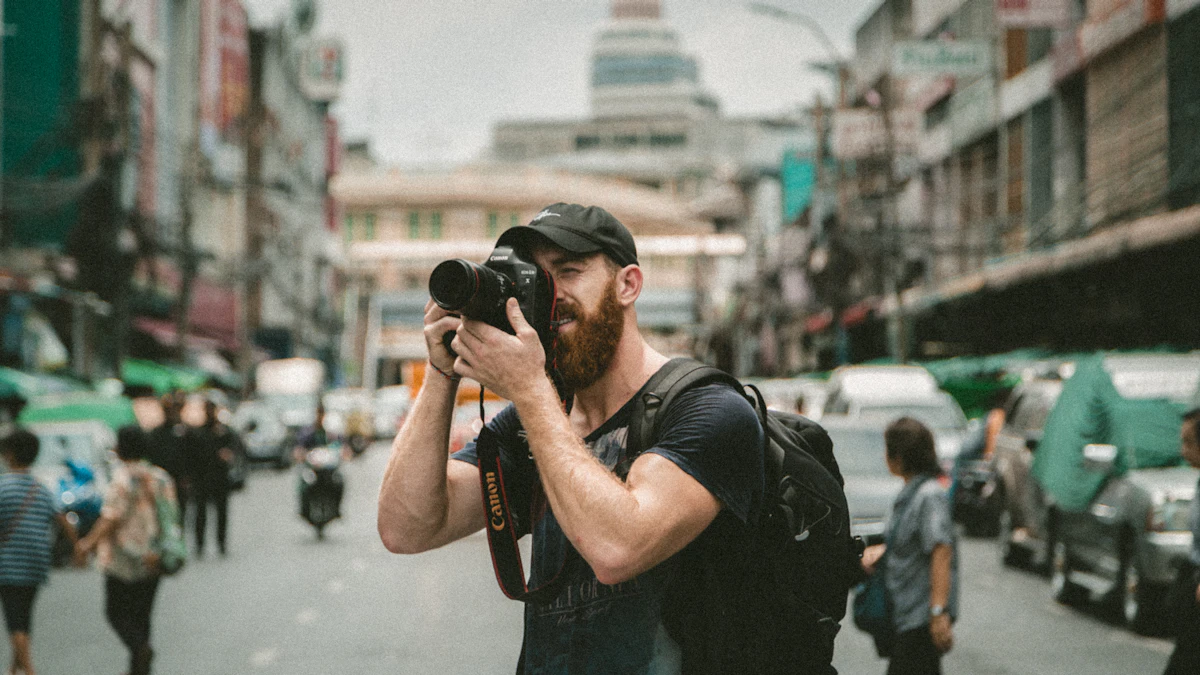 A bearded man in a cap taking a photograph with a large camera on a busy city street