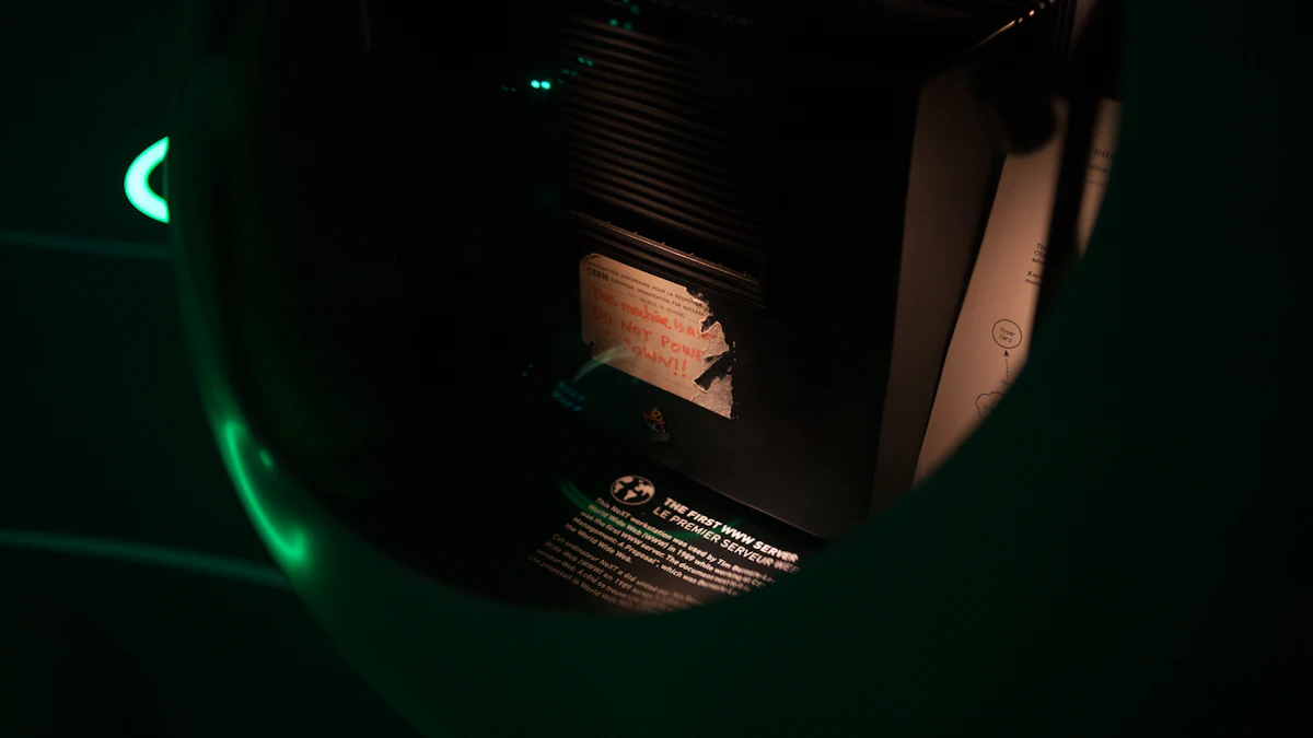 A dark photograph of computer hardware lit by a faint green light